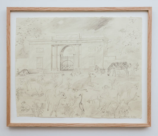 Framed black and white drawing of animals on a plain wall