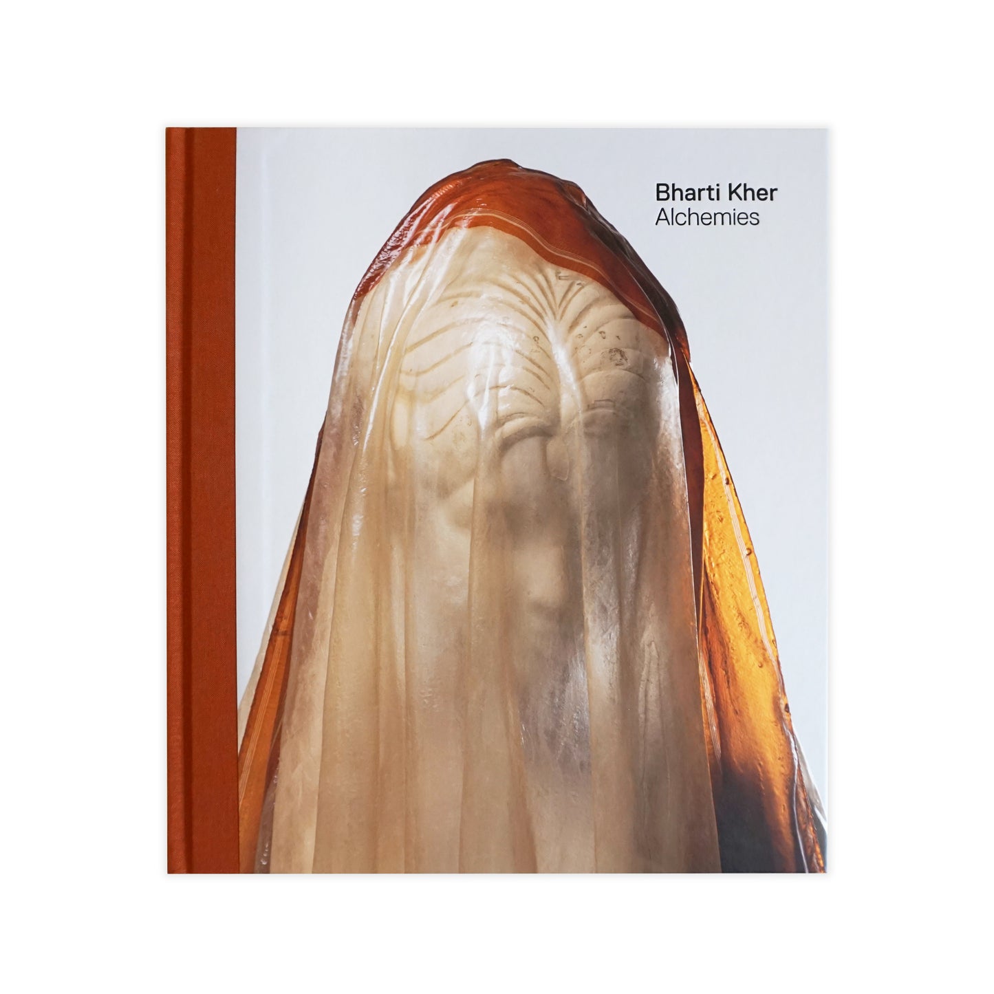 Cover of the Bharti Kher: Alchemies Exhibition Catalogue featuring a sculpture with a female figure.