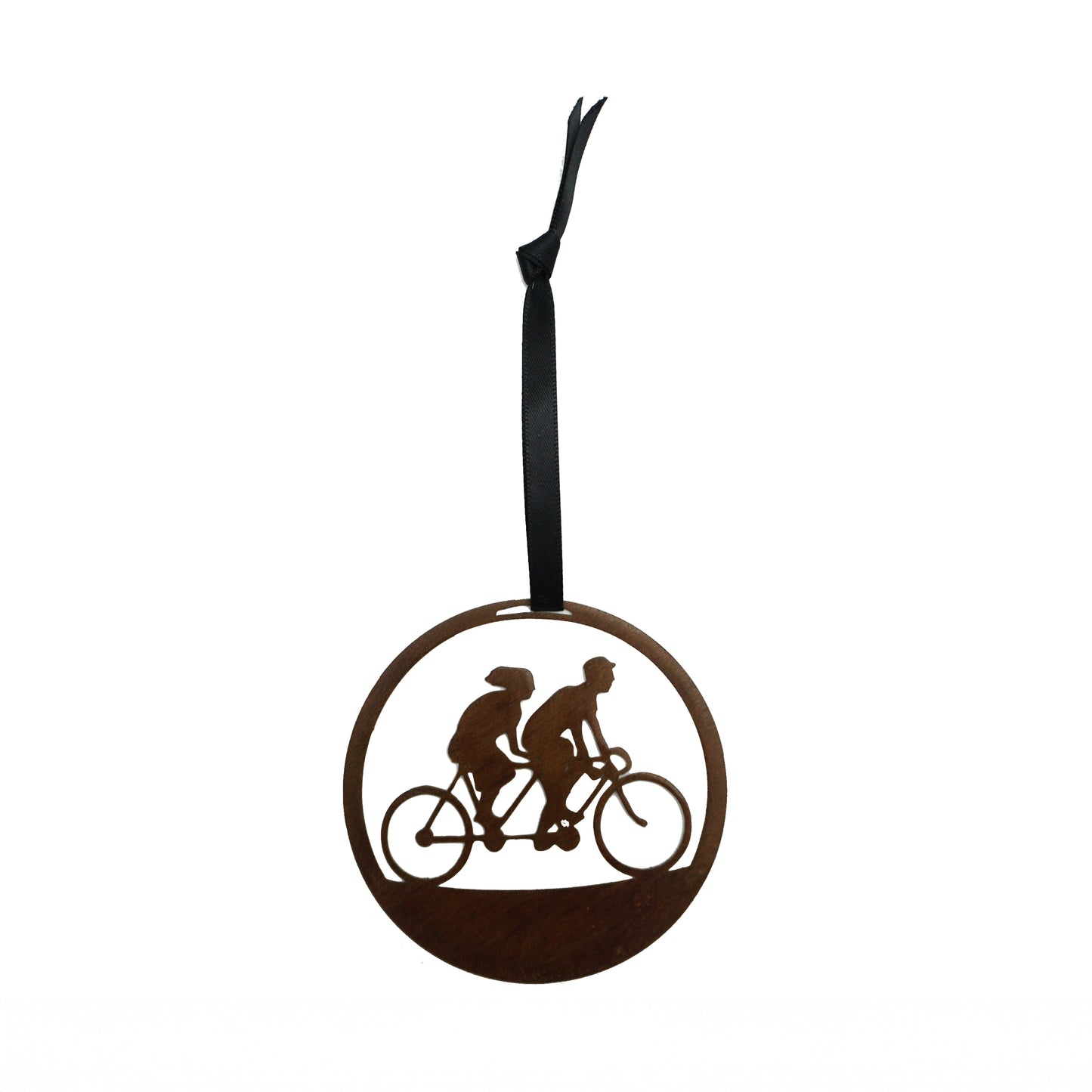 Decorative round mental laser cut ornament with silhouette of two people on a bicycle, hanging from a black ribbon.