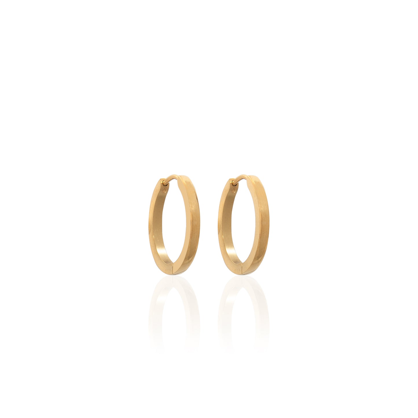 A pair of larger round gold hoop earrings on a plain white background.