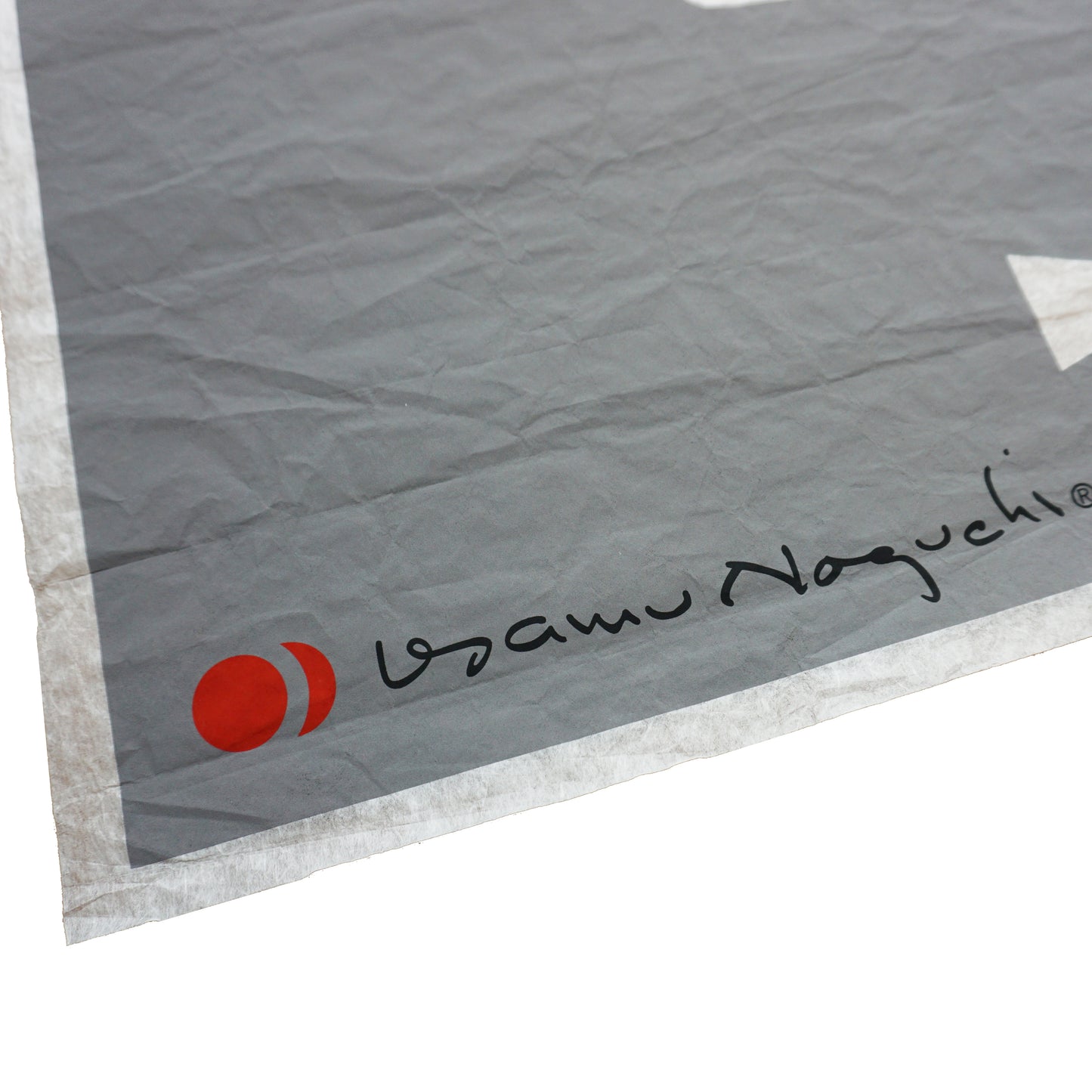 Gray washi paper with a red circle and black text on a white background