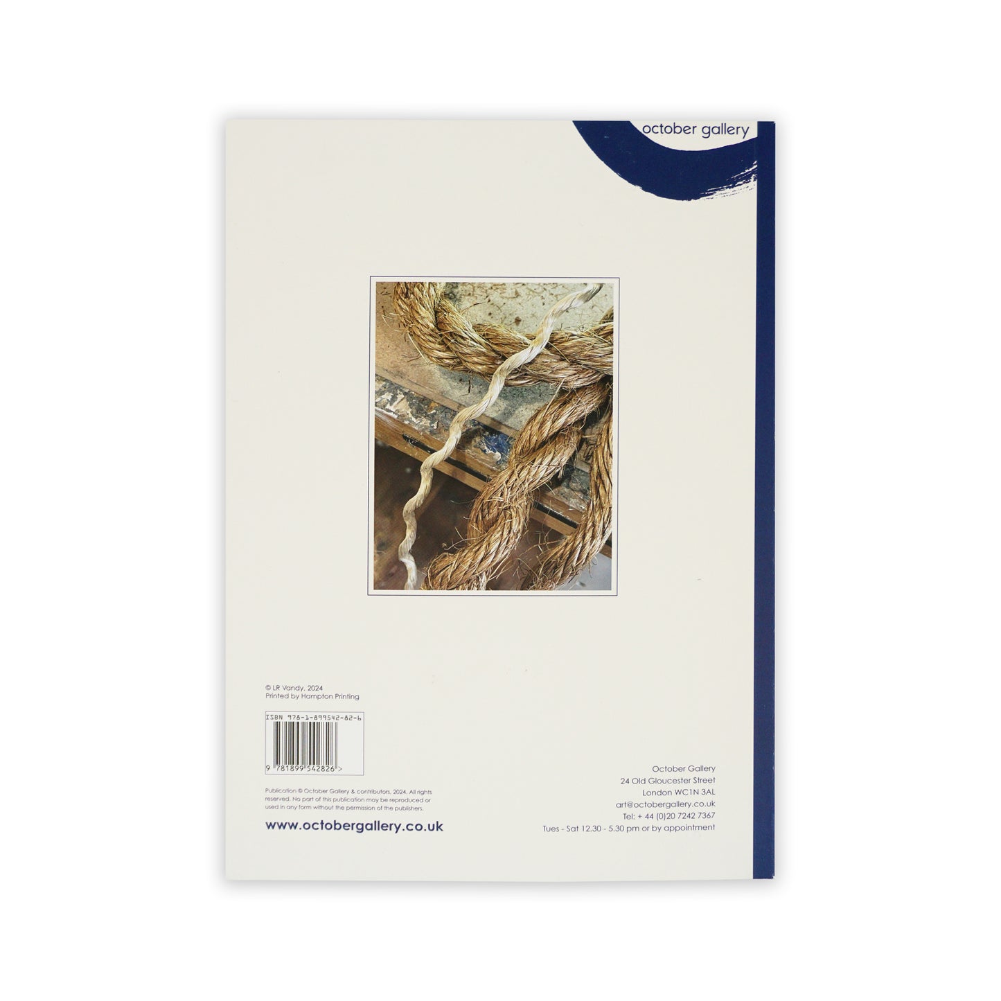 Reverse of Twist by LR Vandy featuring a beige background, blue October Gallery branding and an image in the middle.