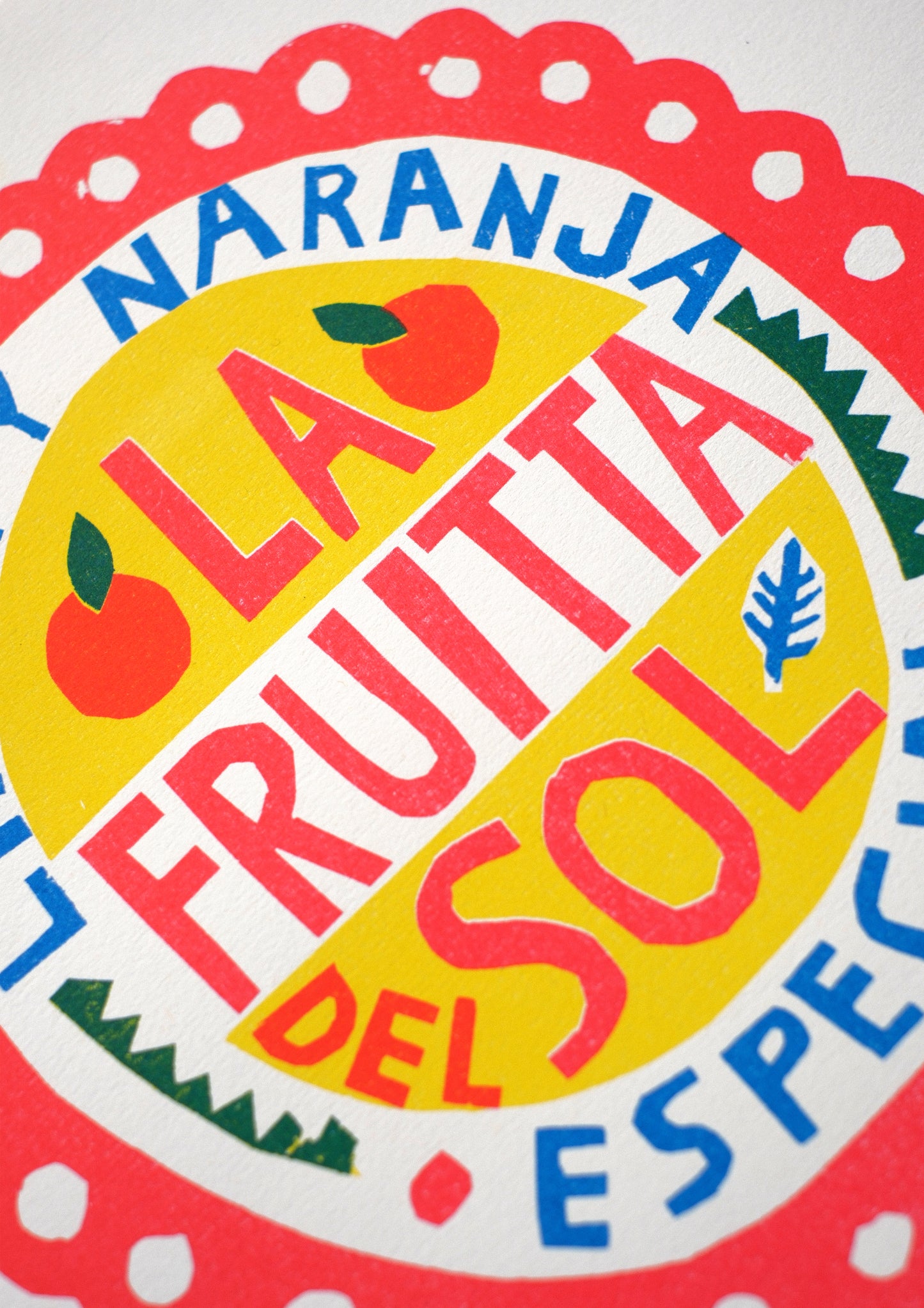 A vibrant, decorative label featuring the text "LA FRUITTA DEL SOL ESPECIAL" in bold, colourful letters. The design includes illustrations of lemons and oranges, framed by a scalloped red border on a light background.