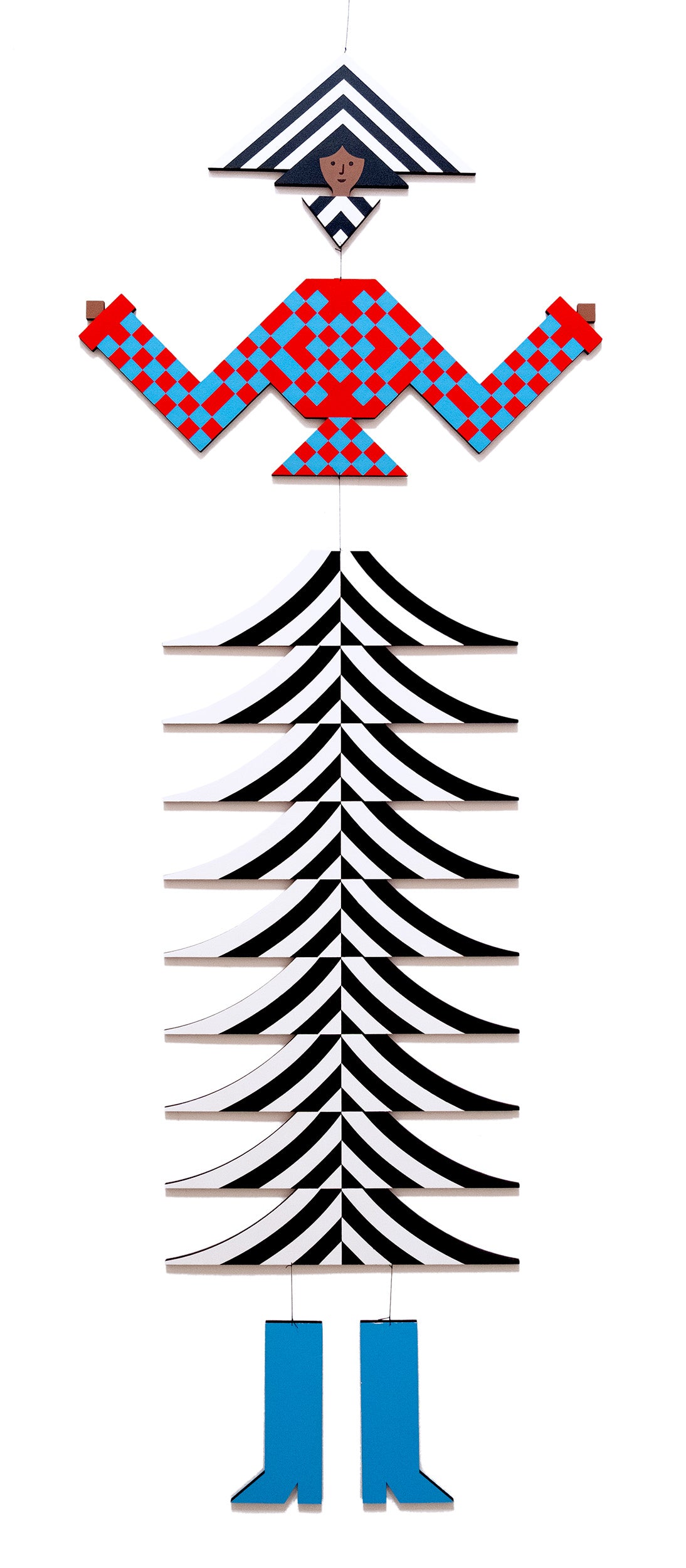 A hanging wooden colourful mobile featuring a full figure with a headdress and boots covered in bright geometric patterns.