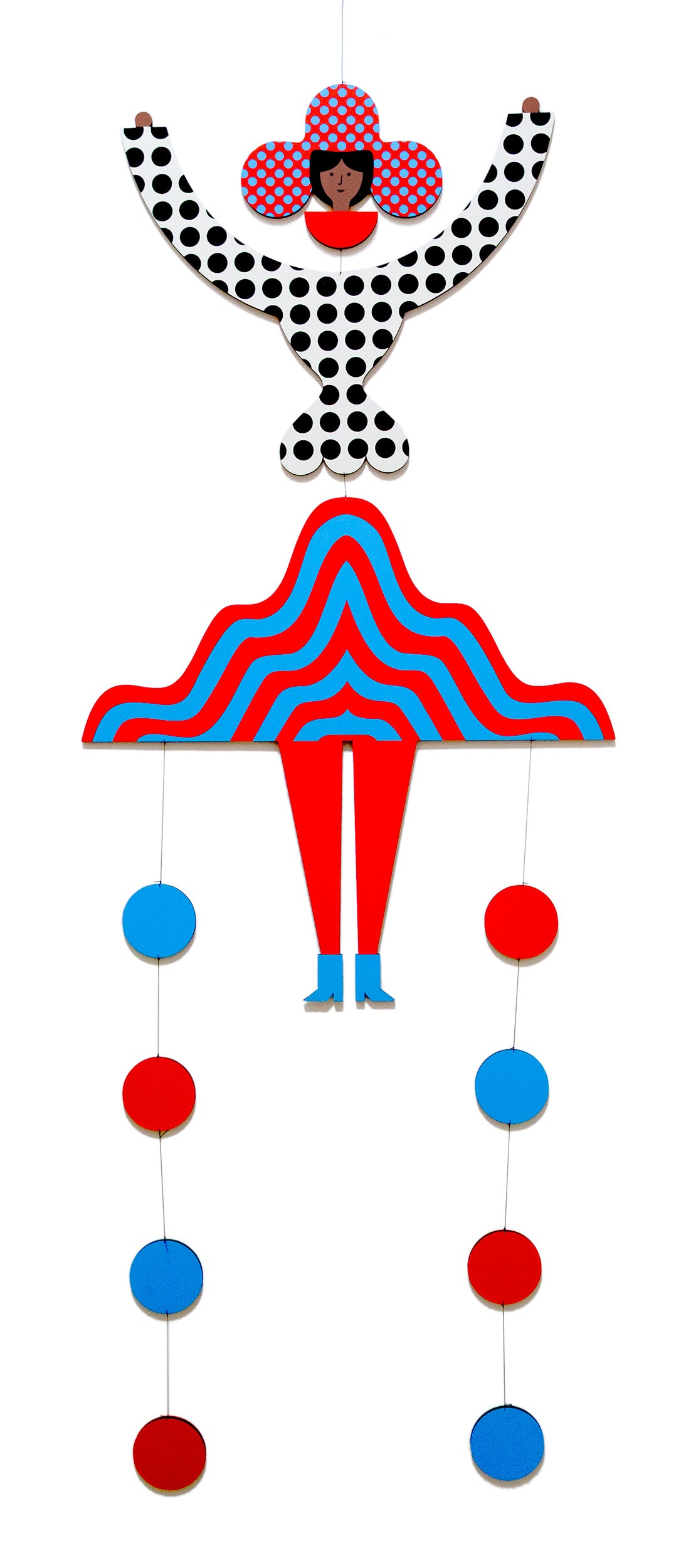 A hanging wooden colourful mobile featuring a full figure with a headdress and boots covered in bright geometric patterns.