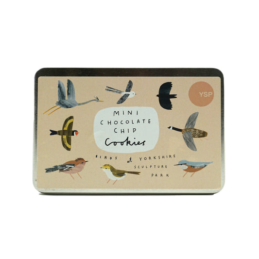 A metal tin of mini chocolate chip cookies with a beige label featuring illustrations of different British birds.
