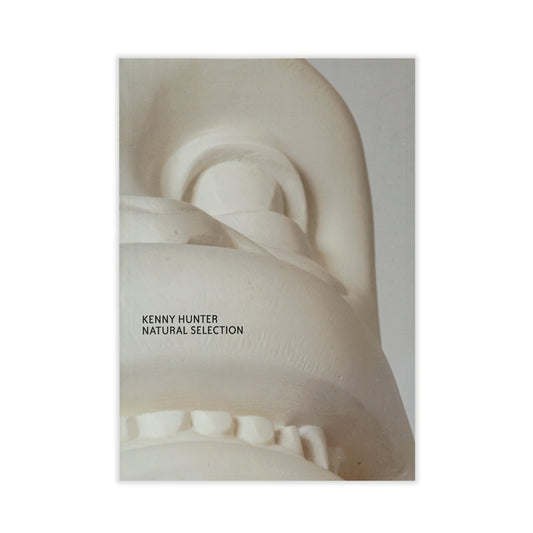 Cover of the exhibition catalogue 'Kenny Hunter: Natural Selection' featuring a white stone sculpture with 'Kenny Hunter' text overlay.