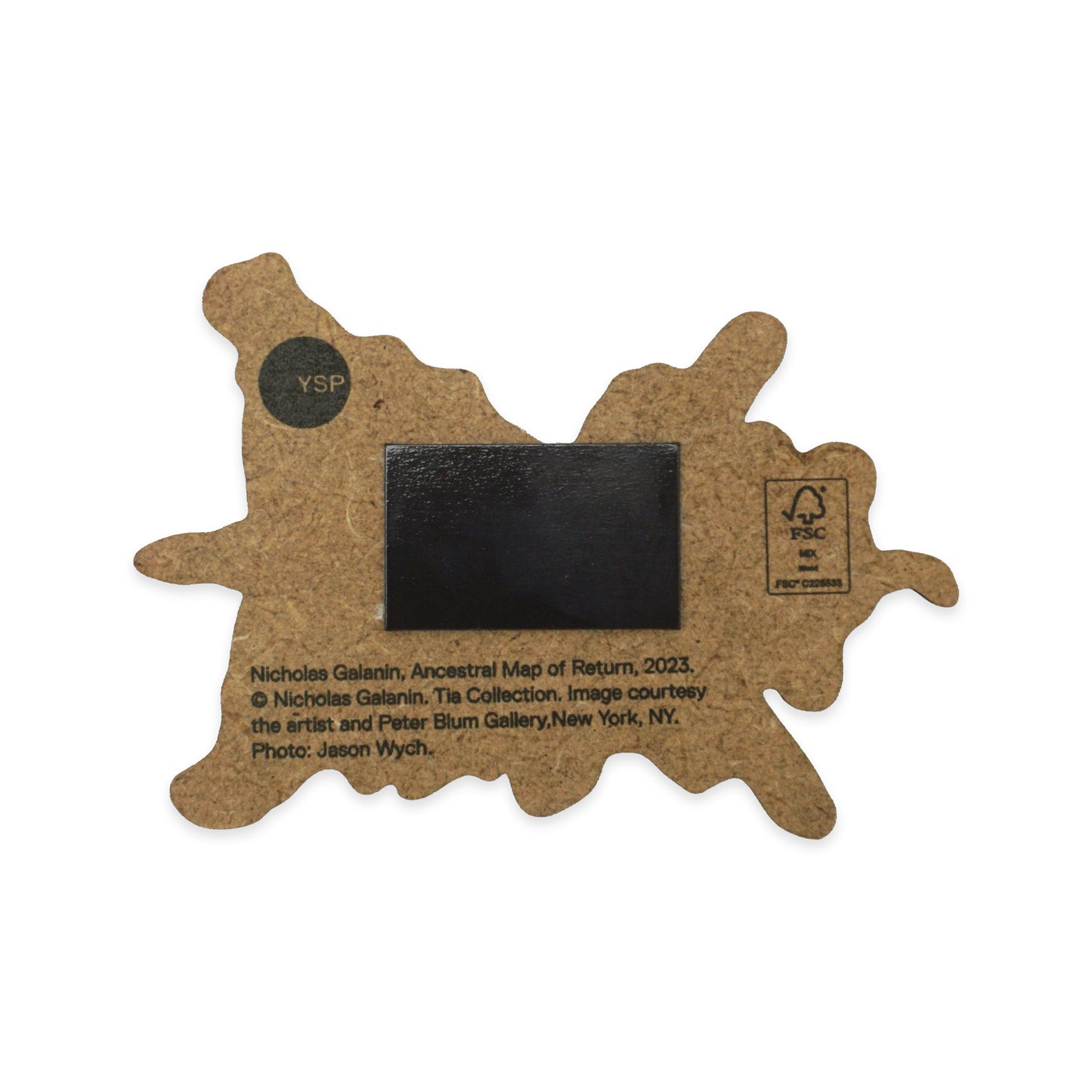 A MDF cut-out in an irregular shape with a black magnet in the centre. It features text about Nichola Galanin's "Ancestral Map of Return, 2023" and includes a logo for FSC certification.