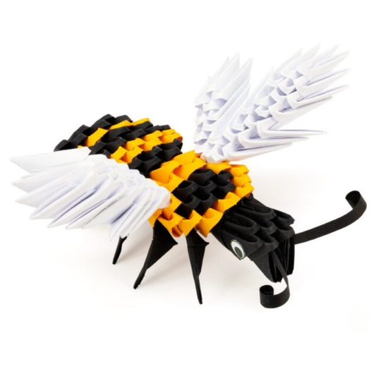 A yellow and black origami paper bumble bee on a plain white background.