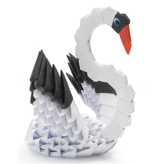 A white and black origami paper swan on a plain white background.