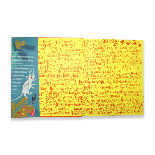 An open book showing bright yellow pages covered in hand scripted red text.