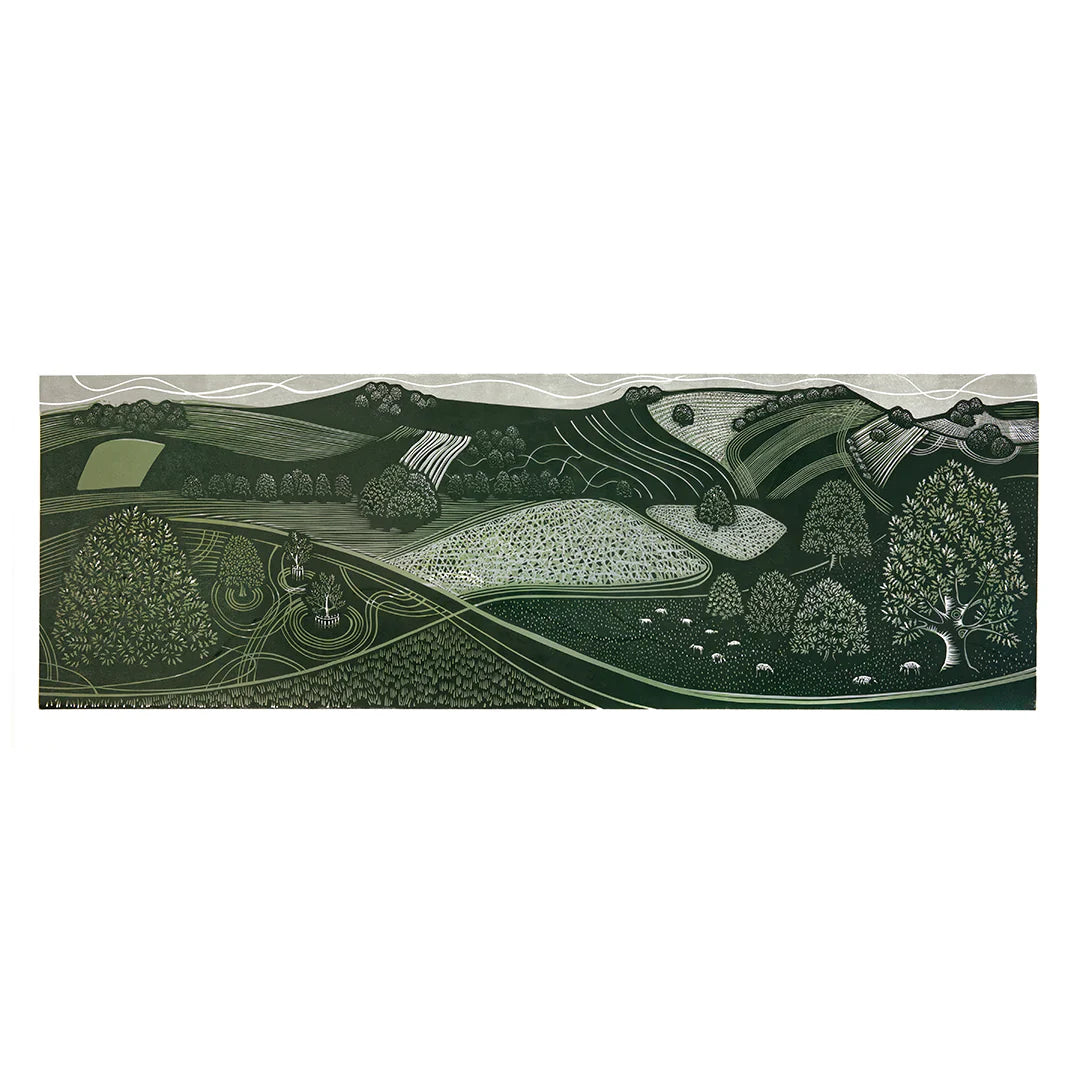A green linocut print featuring a wide shot of a landscape that shows trees, sheep and rolling hills.