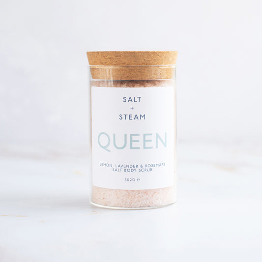 Jar of Salt + Steam Queen salt body scrub with wooden lid on a white background