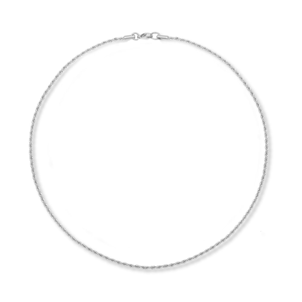A delicate round silver chain on a plain white background.