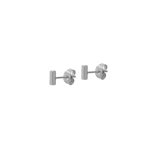 A pair of simple silver bar stud earrings on a plain white background