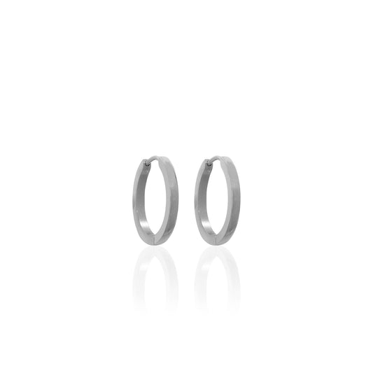 A pair of larger round silver hoop earrings on a plain white background.