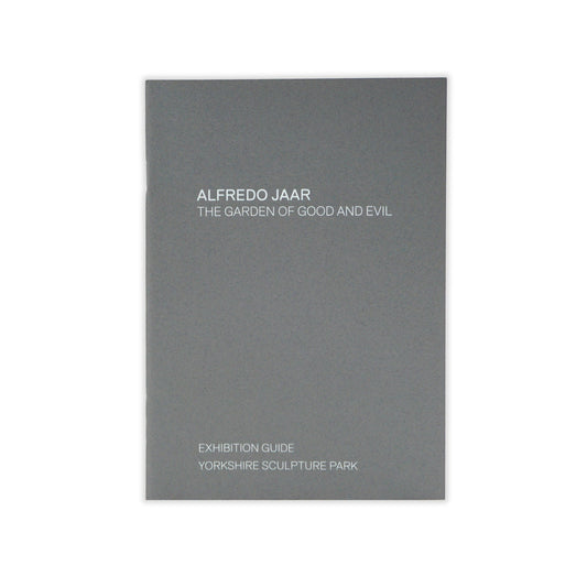 Cover of the exhibition guide 'Alfredo Jaar: The Garden of Good and Evil' printed in white text on a gray background.