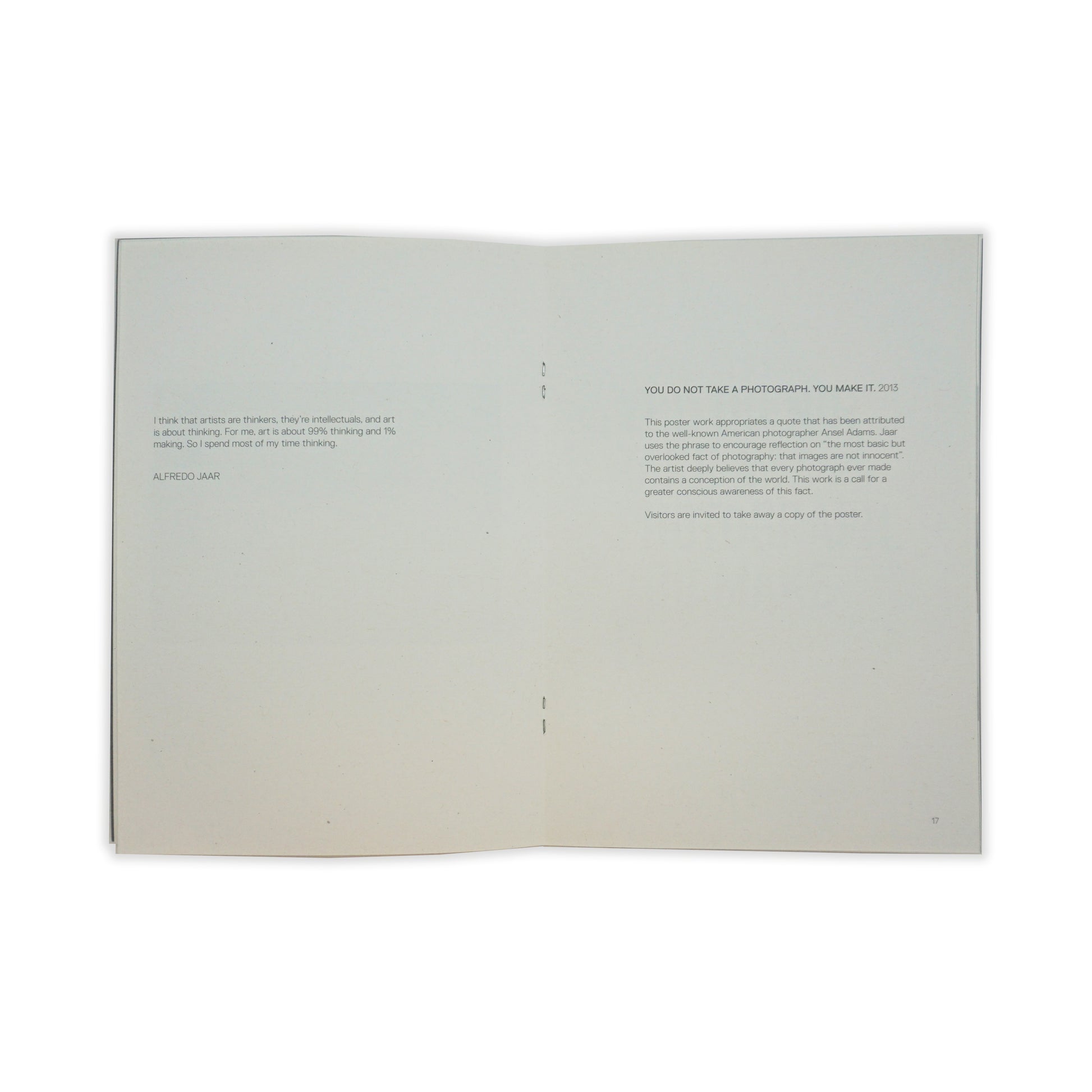 An open spread showing small paragraphs on each page. The text is black on a white background, there are no images.