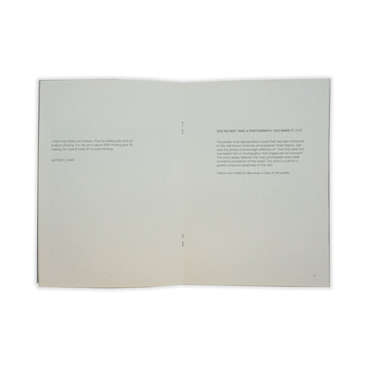 An open spread showing small paragraphs on each page. The text is black on a white background, there are no images.