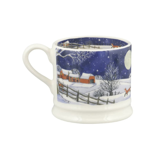 Mug with a winter scene design on a white background
