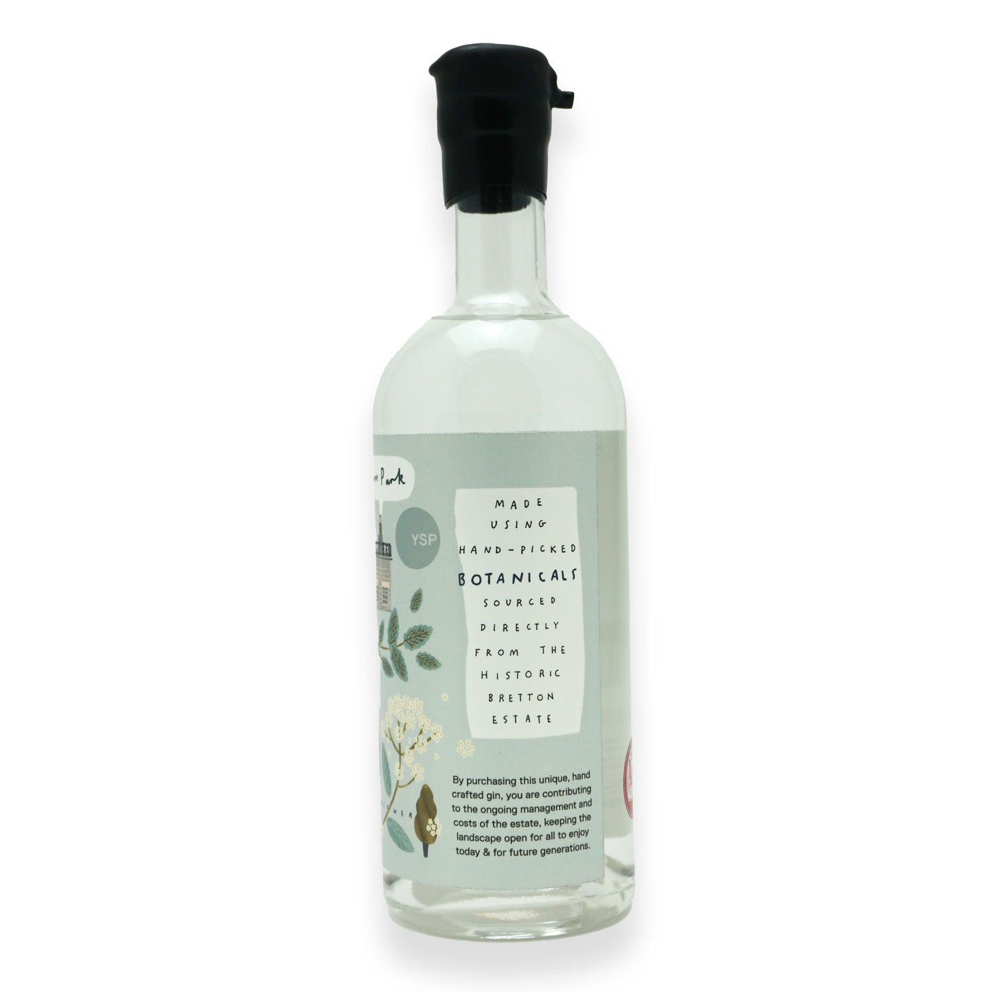 The side of a large glass bottle with black wax dipping on the neck, with a blue label featuring illustrations of botanicals found around Yorkshire Sculpture Park.