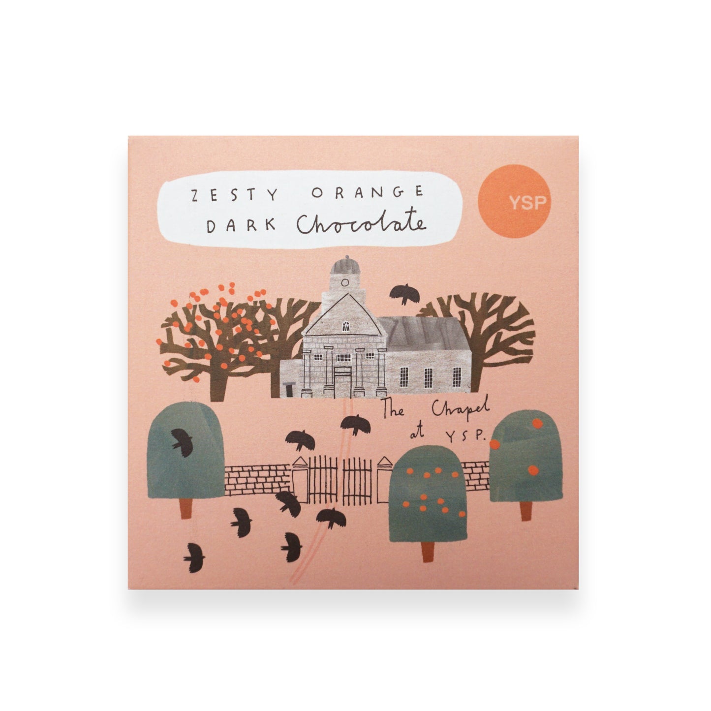 A bar of chocolate in an orange cardboard wrapper that features illustrations of trees, birds and the YSP Chapel.