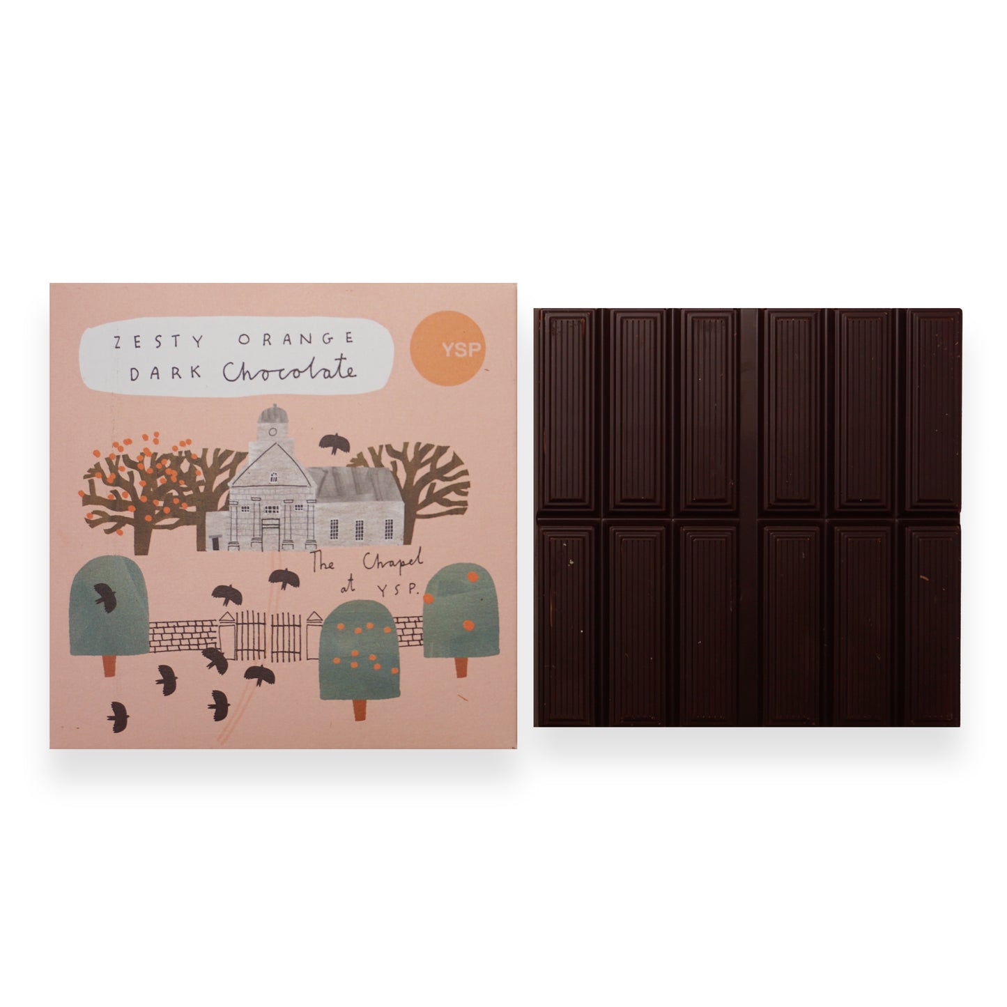 An orange cardboard box featuring illustrations of trees, birds and the YSP Chapel next to a bar of dark chocolate.