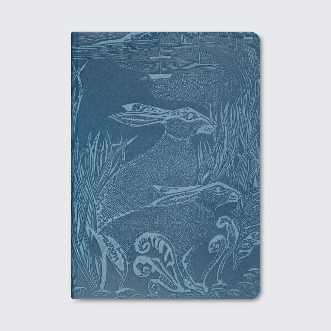 A blue notebook cover featuring an intricate illustration of two hares amidst tall grass, with a serene landscape in the background, including distant boats and a gentle sky. The design is detailed and artistic, evoking a sense of nature.