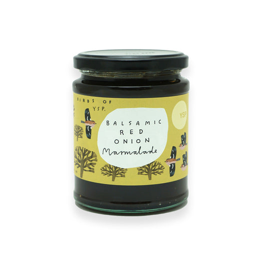 A glass jar with a black lid and a yellow label featuring illustrations of British birds and trees.