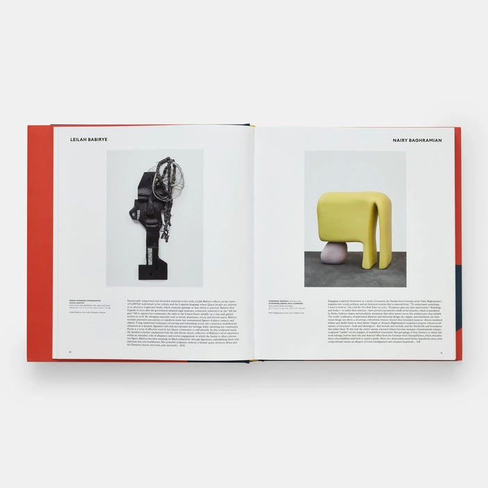 An open book displaying two pages. On the left, a black sculpture with intricate details. On the right, a bright yellow abstract sculpture with a rounded base. Both pieces are accompanied by text, highlighting the artists' names and descriptions.