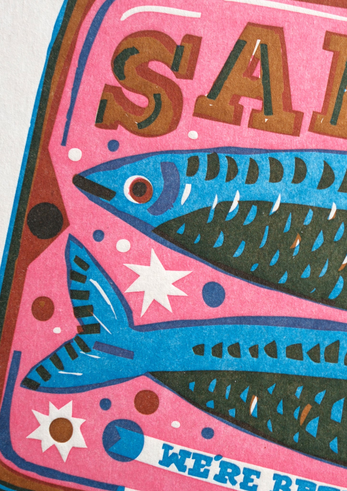 A vibrant illustration of a sardine tin, featuring two stylised fish and the word "SARDINES" prominently displayed. The background is a mix of pink and blue hues, with the phrase "WE'RE BETTER TOGETHER" in decorative lettering.