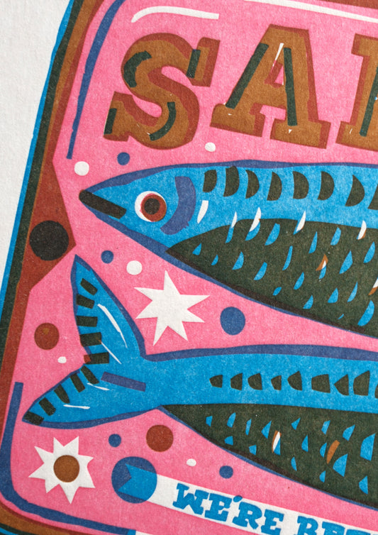 A vibrant illustration of a sardine tin, featuring two stylised fish and the word "SARDINES" prominently displayed. The background is a mix of pink and blue hues, with the phrase "WE'RE BETTER TOGETHER" in decorative lettering.