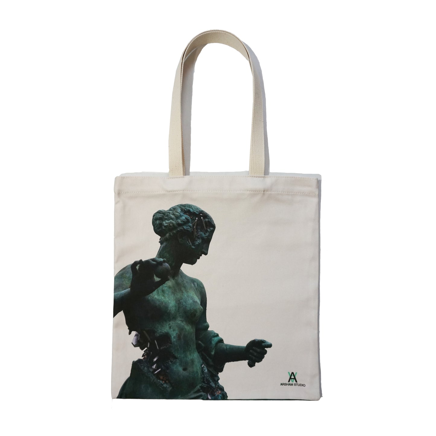 A canvas tote bag featuring a silhouette of a classical statue, depicted in a greenish hue. The statue appears to be a female figure, elegantly posed, with intricate details visible. The bag has two sturdy handles and a logo at the bottom.