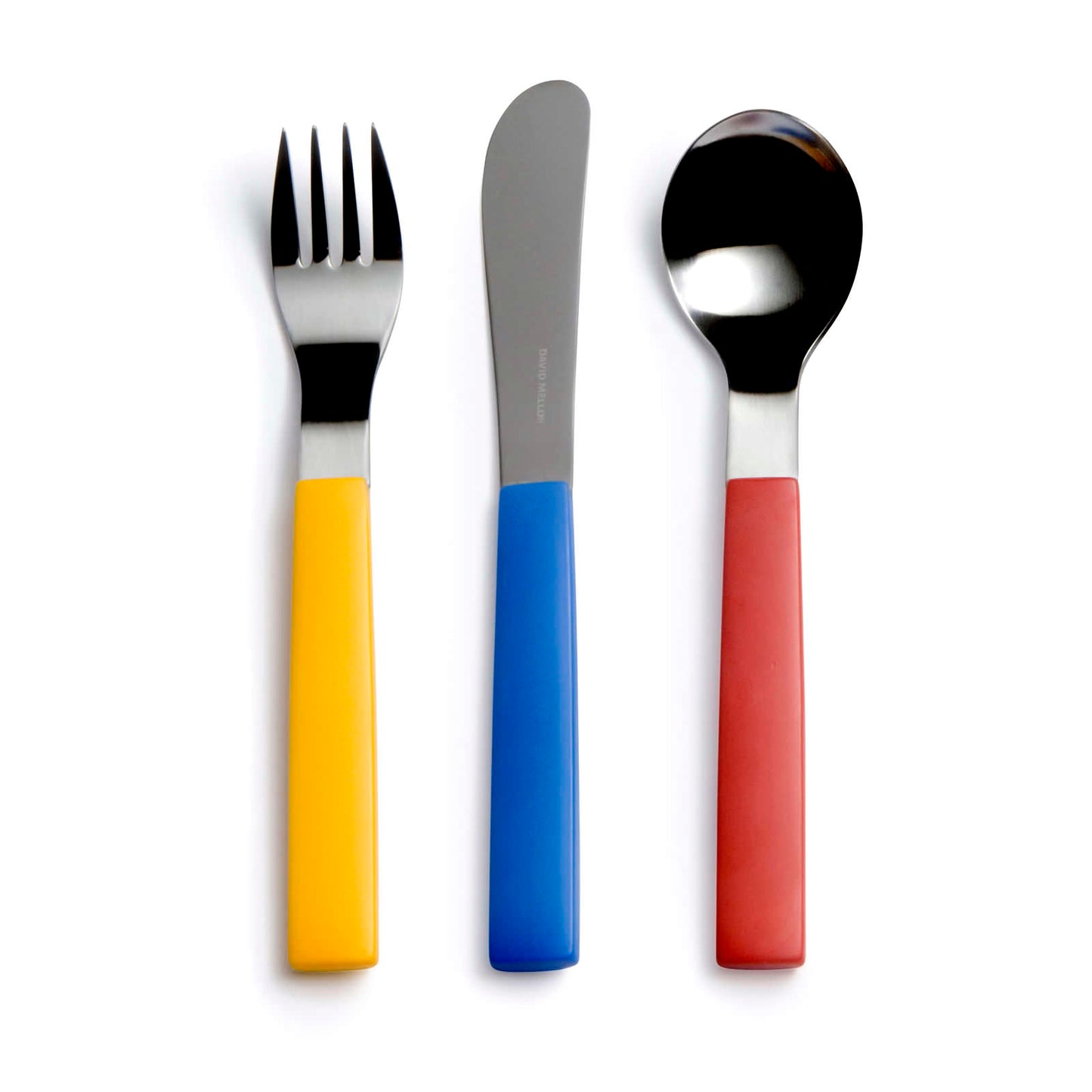 A set of three utensils: a fork with a yellow handle, a knife with a blue handle, and a spoon with a red handle. The utensils have a sleek stainless steel design, contrasting with the vibrant plastic handles.