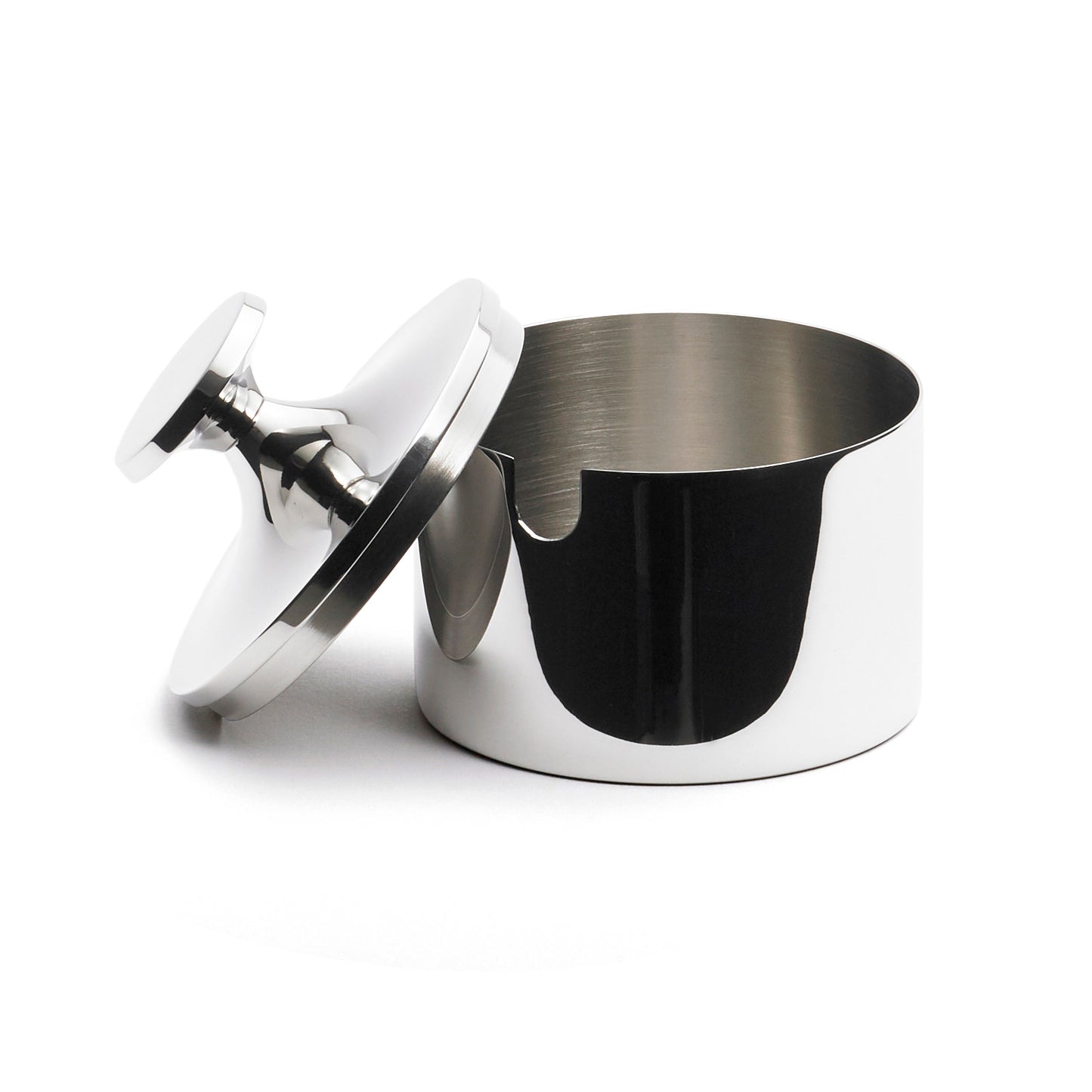 A sleek, silver stainless steel container with a smooth, rounded design. The lid is slightly ajar, revealing a polished interior. The container features a small notch on the side, adding a modern touch to its elegant appearance.