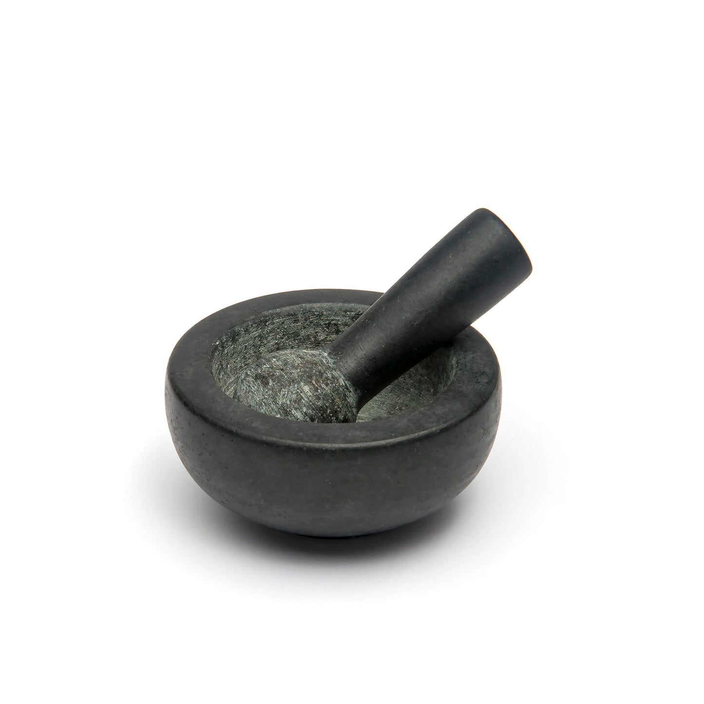 A black stone mortar and pestle set, featuring a round bowl with a smooth interior and a cylindrical pestle. The design is simple and elegant, suitable for grinding herbs and spices. The background is plain white, highlighting the object.