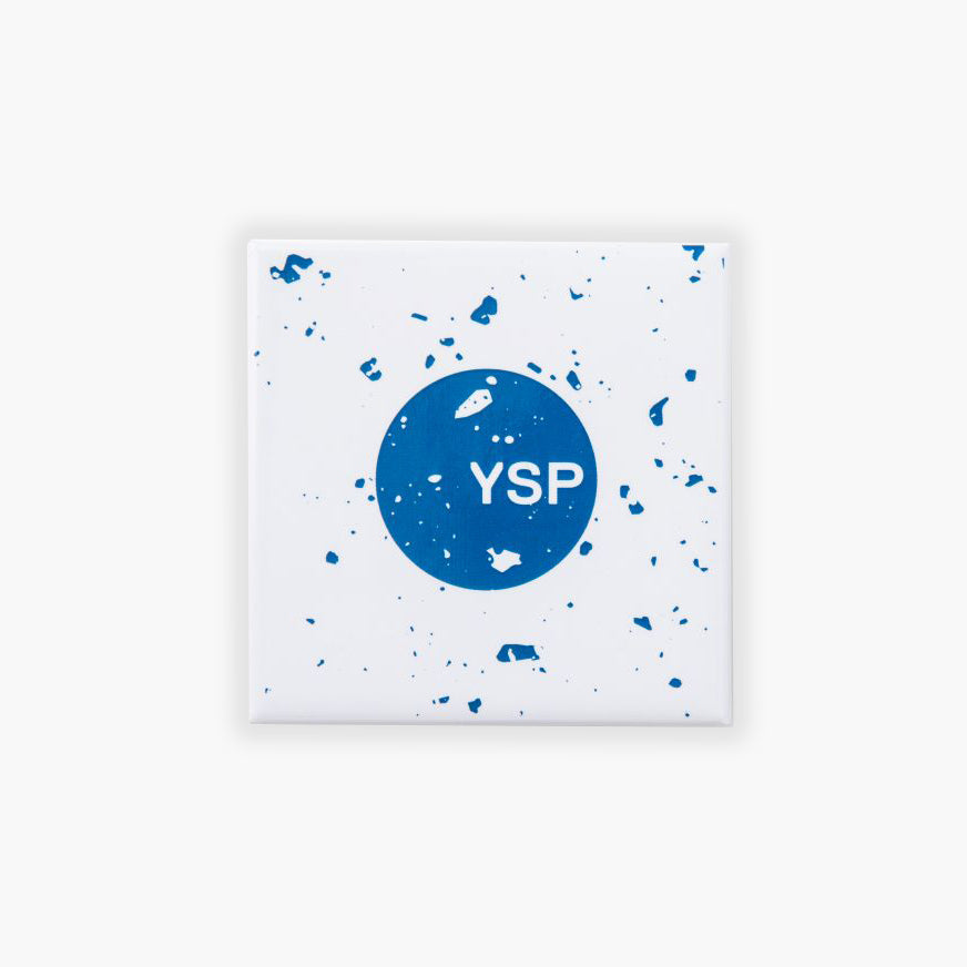 A white square fridge magnets featuring a central blue circle with the letters "YSP" in white.