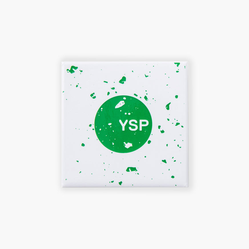 A white square fridge magnets featuring a central green circle with the letters "YSP" in white.