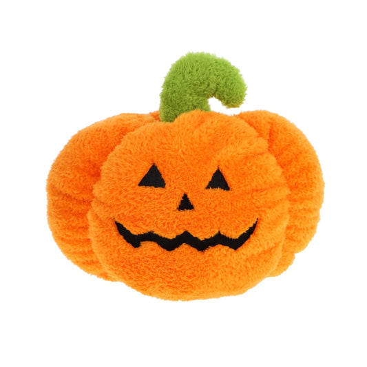 Plush orange pumpkin toy with a smiling face and black eyes on a white background. The pumpkin has a green stalk coming out the top and appears to be in fluffy material. 