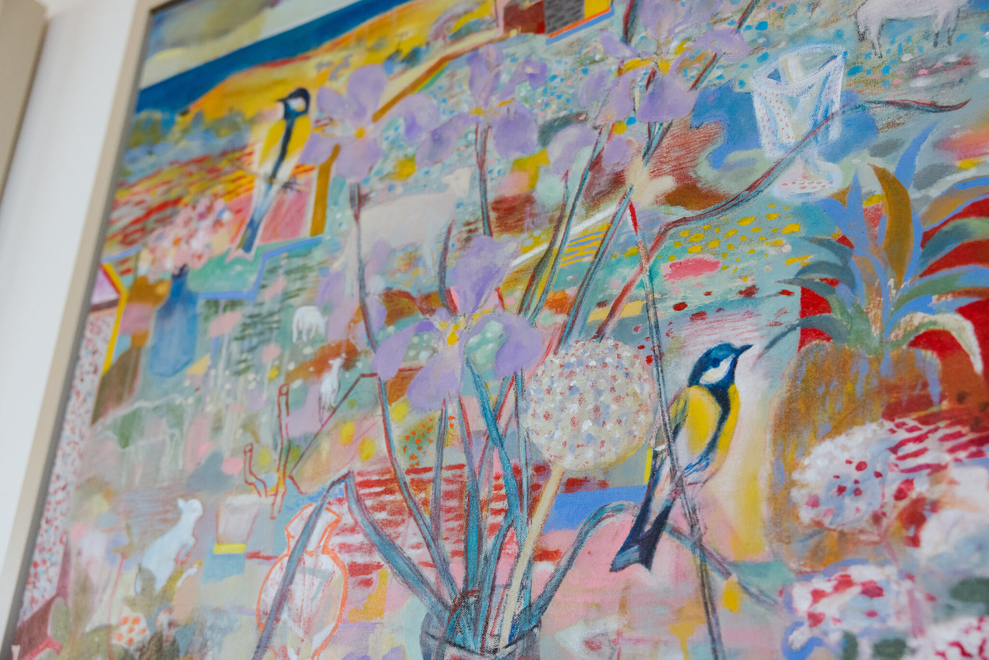 Colorful abstract painting with floral elements and birds.