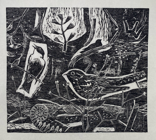 A black wood cut print showing two birds sitting on foliage and branches surrounded by more textured foliage.