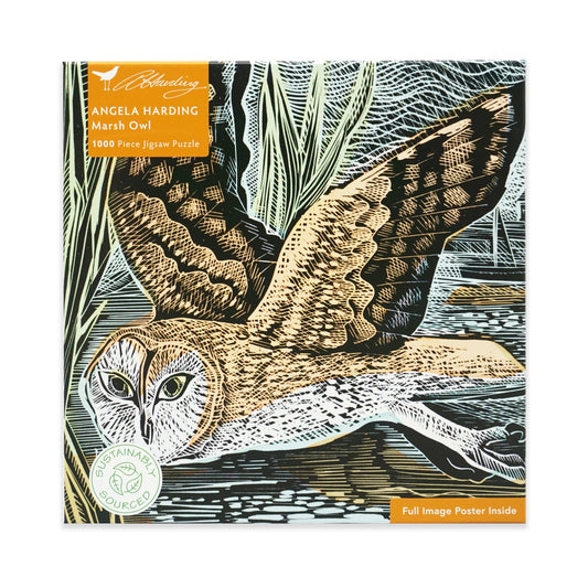 Square jigsaw puzzle box with an owl  in flight illustration. The main colours used are blue, green, beige and white. The box features orange branding and is on a plain white background.