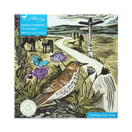 A square jigsaw puzzle box with nature-themed design featuring a bird, two horses, butterflies, and people on a path. The main colours are green, brown and purple with some blue.