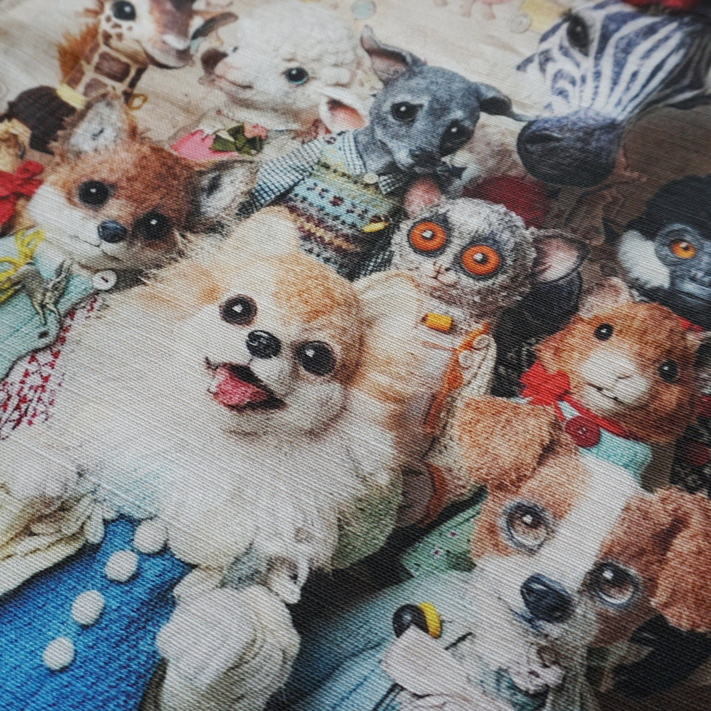 Close-up of a fabric or printed surface featuring a whimsical image of anthropomorphic animals, including dogs, cats, a zebra, and a fox, dressed in colourful clothing.