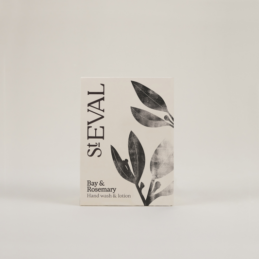 A beige box with a foliage pattern on the right hand side on a plain grey background, featuring the branding 'St Eval' in black text.