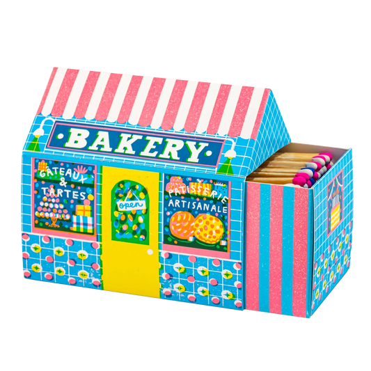 Colourful matchbox with bakery design on a white background