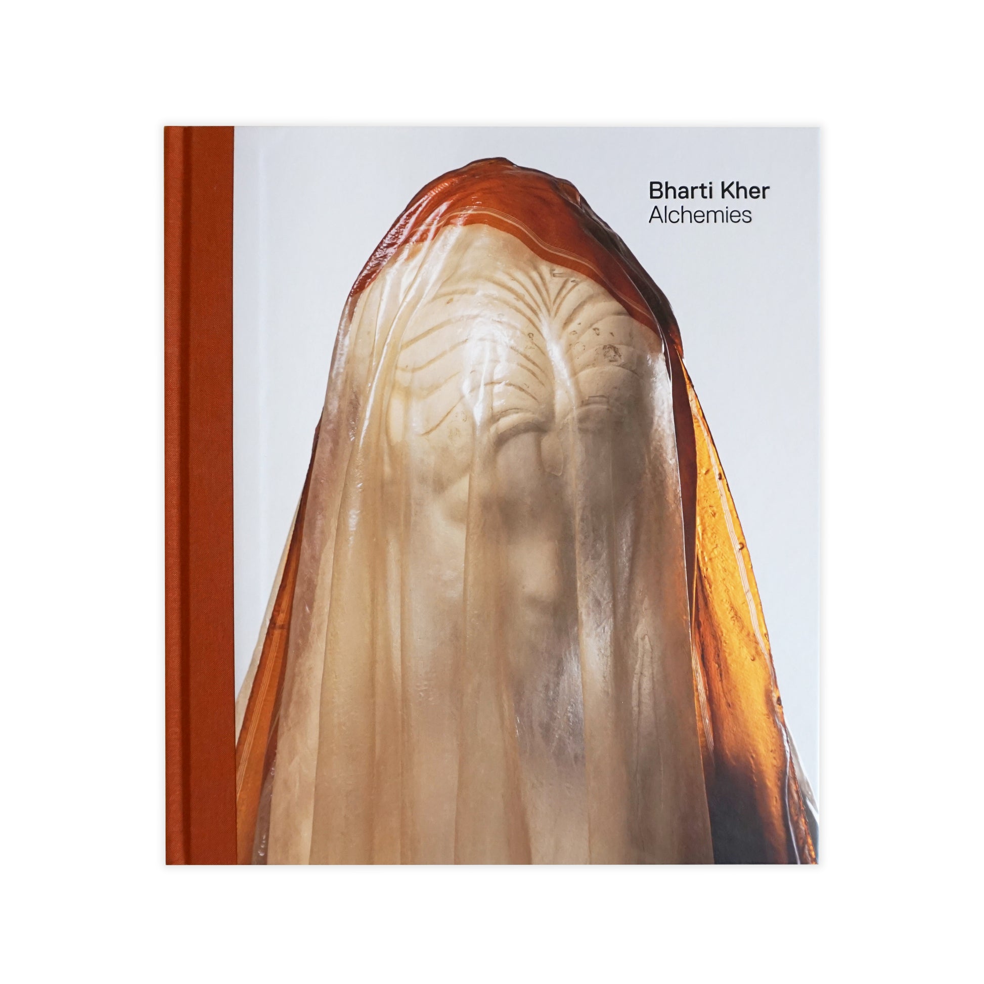 Cover of the Bharti Kher: Alchemies Exhibition Catalogue featuring a sculpture with a female figure.