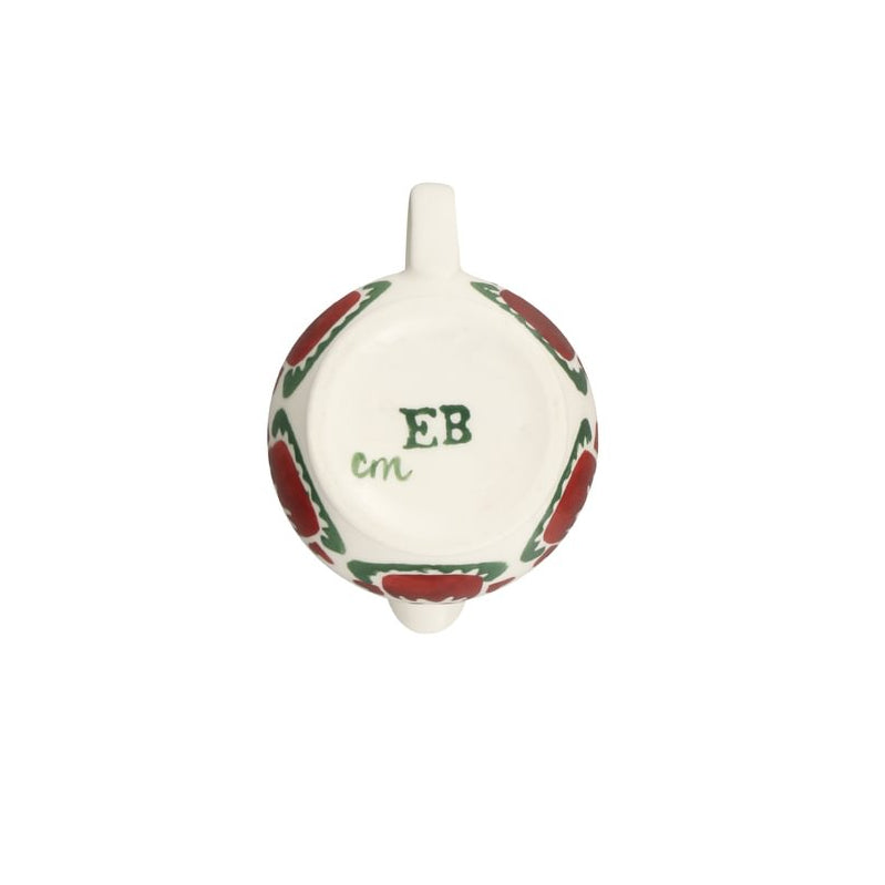 The base of a white ceramic jug with a red and green floral border and green lettering 'EB em' on the bottom, shown against a plain white background.