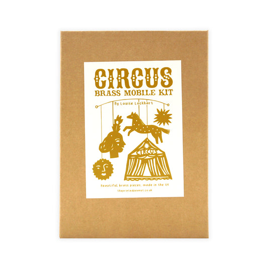 Circus brass mobile kit packaging with illustrations on a white background