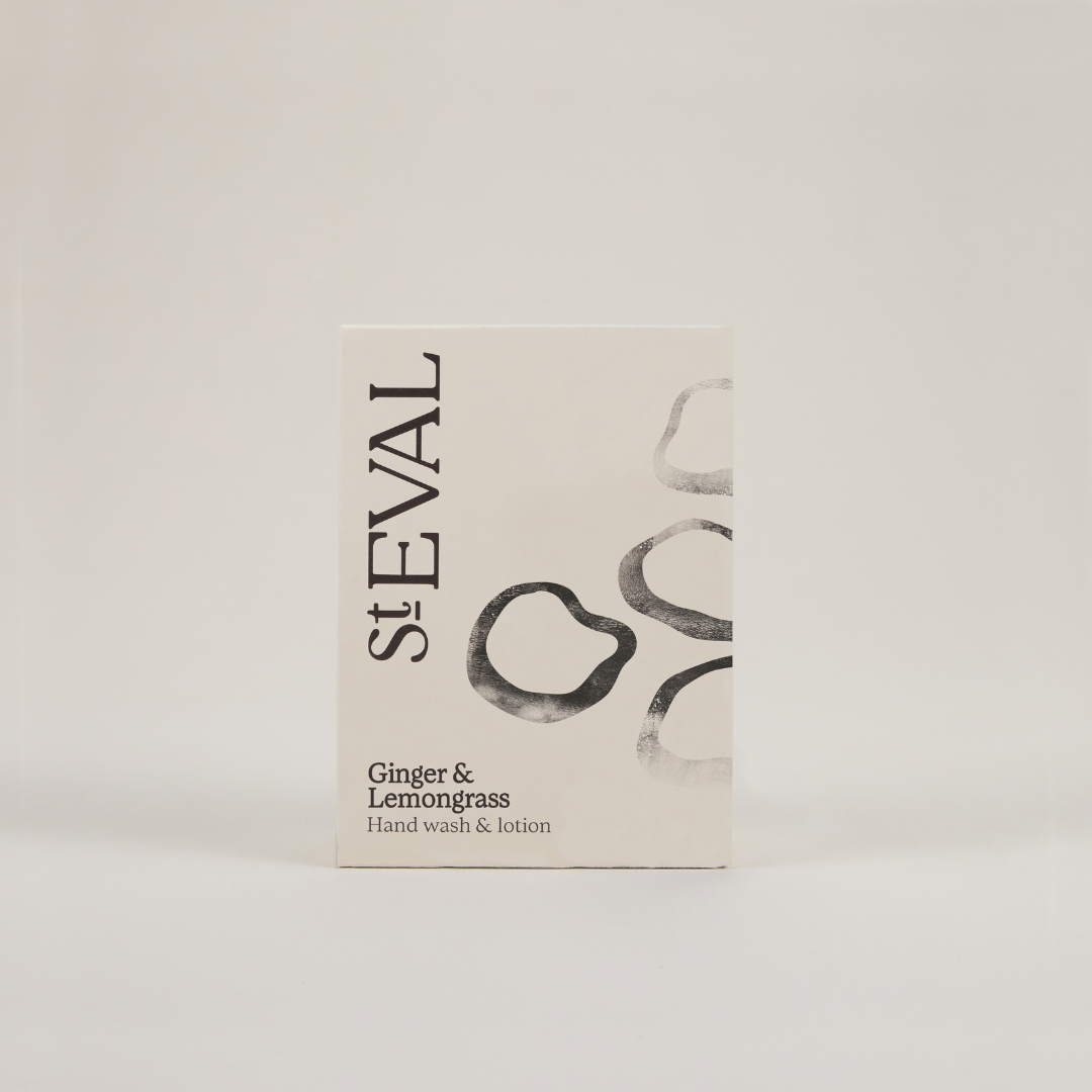 A beige box with circular patterns on the right hand side on a plain grey background, featuring the branding 'St Eval' in black text.